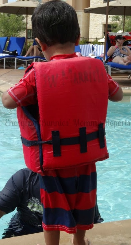 Child near a swimming pool